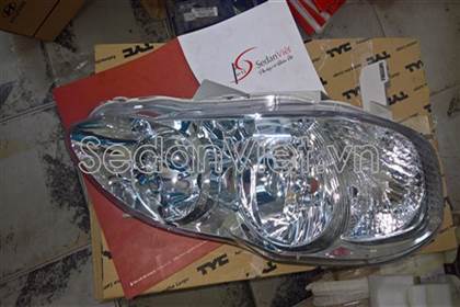 Vỏ đèn pha trái Toyota Corolla 8117002300-TYC giá rẻ