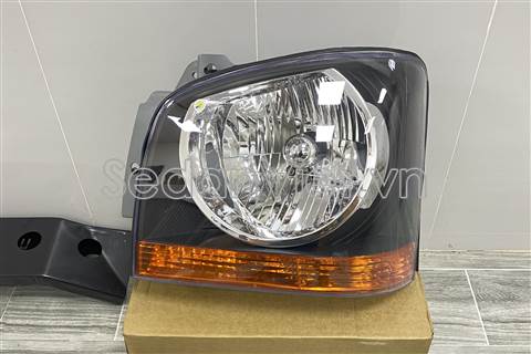 Vỏ đèn pha trái dùng cho xe Thaco frontiner k125 2015