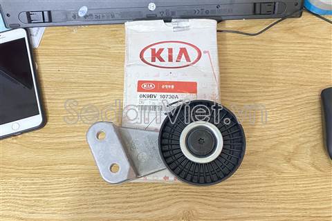 Bi tì dây curoa Kia Carnival 2004-2007