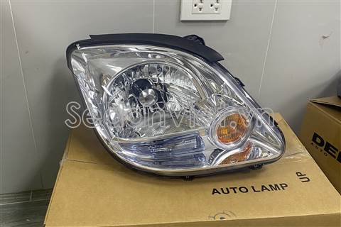 Vỏ đèn pha phải Mitsubishi Jolie 2004-2006
