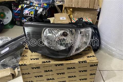 Vỏ đèn pha trái Mitsubishi Triton 2010-2013