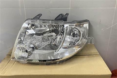 Vỏ đèn pha trái Suzuki APV 2006-2011