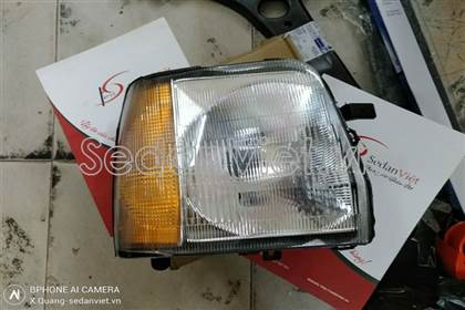 Vỏ đèn pha trái Suzuki wagon 2002