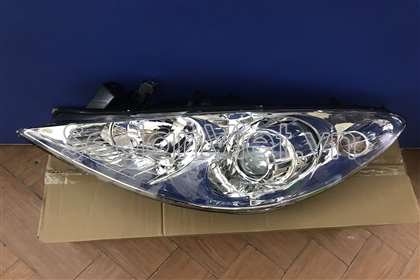 Vỏ đèn pha trái Peugeot 307 2007