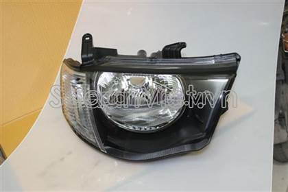 Vỏ đèn pha trái Mitsubishi Triton 2010-2013