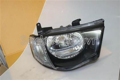Vỏ đèn pha phải Mitsubishi Triton 2010-2013