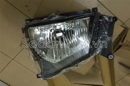 Vỏ đèn pha trái Isuzu QKR 600P 2015