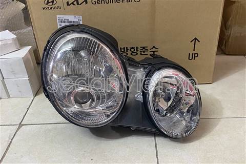 Vỏ đèn pha phải Kia Opirus 2010